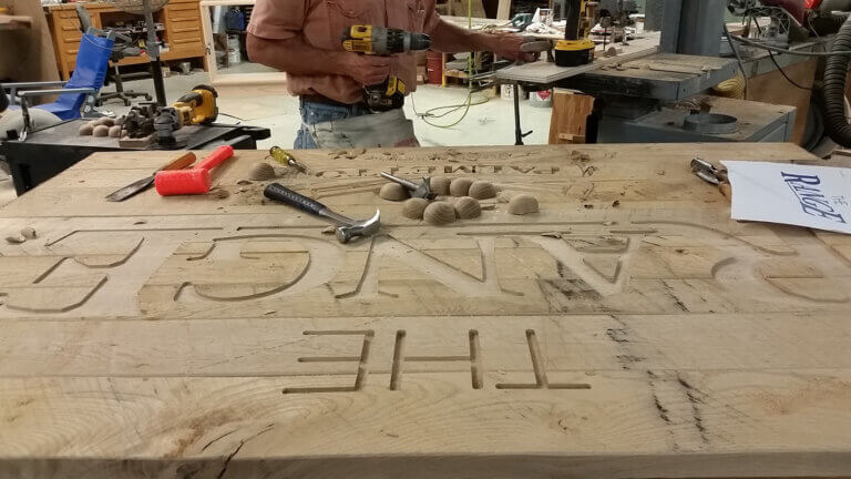 Wood sign carving