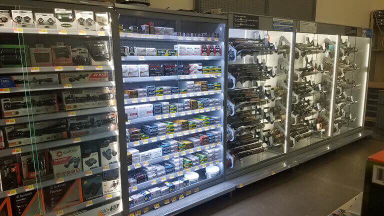 Lighted shelf displaying merchandise