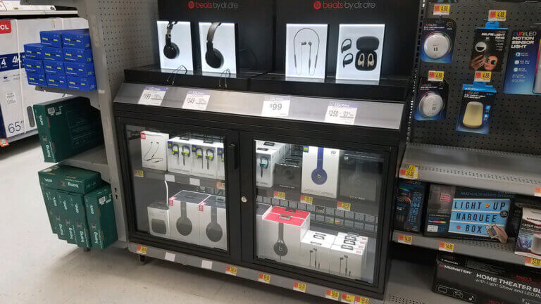 Lighted shelf displaying merchandise