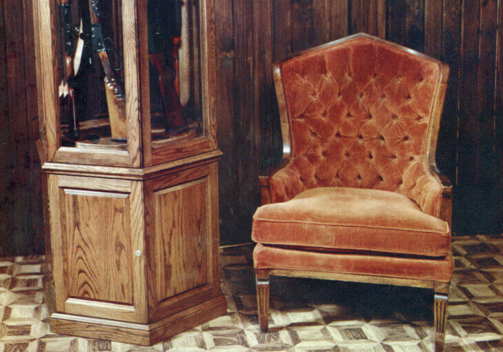 Gun Cabinet Ad Vintage gun cabinet and armchair